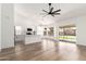 Open floor plan showcases the kitchen, dining and living area with natural light at 15226 S 14Th Dr, Phoenix, AZ 85045