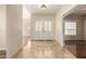 Bright foyer with double front doors, marble flooring, and an open layout at 15602 N 19Th St, Phoenix, AZ 85022