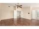 Spacious main bedroom with hardwood floors, attached bathroom and ample lighting at 15602 N 19Th St, Phoenix, AZ 85022