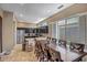 Eat-in kitchen features granite countertops, stainless steel appliances, and a breakfast bar with seating at 17493 W Arroyo Way, Goodyear, AZ 85338