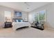 Serene main bedroom with plantation shutters, neutral walls, and plush carpeting at 19403 E Apricot Ln, Queen Creek, AZ 85142