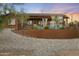Spacious backyard with a pool, patio, desert landscaping, and mountain views at 1943 E Paso Nuevo Dr, Phoenix, AZ 85086