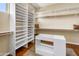 Well-organized walk-in closet with built-in shelving and ample storage space at 1943 E Paso Nuevo Dr, Phoenix, AZ 85086