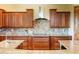 Close-up of a kitchen with custom cabinets, granite countertops, and a tile backsplash at 1943 E Paso Nuevo Dr, Phoenix, AZ 85086