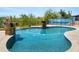 This refreshing pool features Baja steps, a charming mural and desert landscaping at 1943 E Paso Nuevo Dr, Phoenix, AZ 85086