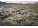 Amazing property with a private pool, landscaping, and seating areas set against mountain views at 1943 E Paso Nuevo Dr, Phoenix, AZ 85086