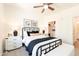Comfortable bedroom featuring a queen bed, side tables and modern design at 2511 W Queen Creek Rd # 325, Chandler, AZ 85248