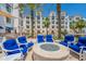 Inviting outdoor lounge area with a fire pit and comfortable seating, perfect for relaxing and socializing at 2511 W Queen Creek Rd # 325, Chandler, AZ 85248