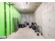 Unfinished storage area with concrete walls, ready to be customized to fit your needs at 2511 W Queen Creek Rd # 325, Chandler, AZ 85248