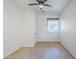 Bedroom with a ceiling fan, a window with blinds, and neutral flooring at 2755 N 103Rd Ave, Avondale, AZ 85392