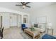 Open-concept living room with modern decor and archways, comfortable seating arrangement and stylish furniture at 2755 N 103Rd Ave, Avondale, AZ 85392