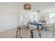 Open floor plan showcases the dining area, living room, and doorway to the kitchen at 2755 N 103Rd Ave, Avondale, AZ 85392