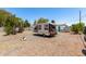 Expansive backyard with gravel, an RV and a shed, offering outdoor space at 2802 E Virginia Ave, Phoenix, AZ 85008