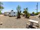 Large gravel backyard features RV parking and a shed, providing ample space at 2802 E Virginia Ave, Phoenix, AZ 85008