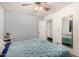 Bedroom with tiled floor, blue accents and a mirror at 2802 E Virginia Ave, Phoenix, AZ 85008