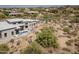 View of a modern home, landscaping, pool, and desert scenery at 28349 N 113Th St, Scottsdale, AZ 85262