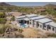 An aerial view of a backyard featuring a modern pool and patio area at 28349 N 113Th St, Scottsdale, AZ 85262
