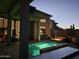 Backyard swimming pool and lounge area, creating an inviting outdoor living space with a fire pit at 28349 N 113Th St, Scottsdale, AZ 85262