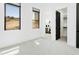 Bright bedroom with windows and a view; also features an ensuite bathroom and walk-in closet at 28349 N 113Th St, Scottsdale, AZ 85262