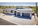 Stunning contemporary home featuring a stylish gray driveway and xeriscaped front yard at 28349 N 113Th St, Scottsdale, AZ 85262