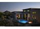 Modern home with a refreshing pool and cozy fire pit in the backyard at 28349 N 113Th St, Scottsdale, AZ 85262