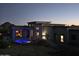 Beautiful home featuring a private pool and modern architectural design at twilight at 28349 N 113Th St, Scottsdale, AZ 85262