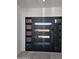 A modern front door with side panels welcomes you into the home at 28349 N 113Th St, Scottsdale, AZ 85262