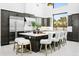 Bright, modern kitchen features a large island with seating, stainless steel appliances, and mountain views at 28349 N 113Th St, Scottsdale, AZ 85262
