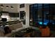Living Room featuring modern kitchen with outdoor view, fireplace, seating and lighting features at 28349 N 113Th St, Scottsdale, AZ 85262