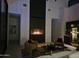 Living Room featuring fireplace, comfortable seating and modern decor elements at 28349 N 113Th St, Scottsdale, AZ 85262