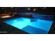 Backyard swimming pool with relaxing lounge area and fire pit under the night sky at 28349 N 113Th St, Scottsdale, AZ 85262