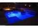Backyard swimming pool with a relaxing lounge area and waterfall, surrounded by desert landscape at 28349 N 113Th St, Scottsdale, AZ 85262