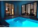 Backyard swimming pool with indoor views, providing a seamless transition between indoor and outdoor living spaces at 28349 N 113Th St, Scottsdale, AZ 85262