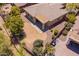 Aerial view of backyard with covered patio, low-maintenance landscaping, and a wrought iron fence at 41227 N Rolling Green Way, Anthem, AZ 85086