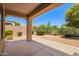 Backyard with covered patio and desert landscaping at 41227 N Rolling Green Way, Anthem, AZ 85086