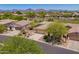 Desert home with meticulously xeriscaped front yard in an upscale community near walking and biking trails at 41227 N Rolling Green Way, Anthem, AZ 85086