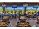 Modern fitness center equipped with treadmills and scenic views for an enjoyable workout experience at 41227 N Rolling Green Way, Anthem, AZ 85086