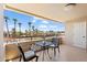 Enjoy city views from this cozy balcony with a table and chairs at 4200 N Miller Rd # 408, Scottsdale, AZ 85251