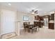 Inviting dining area with seating for six, adjacent to the kitchen and stainless steel appliances at 4200 N Miller Rd # 408, Scottsdale, AZ 85251