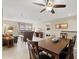 Spacious living and dining area featuring neutral tones and access to an outdoor balcony at 4200 N Miller Rd # 408, Scottsdale, AZ 85251