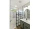 Beautiful bathroom with a marble countertop, modern fixtures and a glass-enclosed shower with tile accents at 4524 E Narrowleaf Dr, Gilbert, AZ 85298