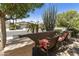 Charming front porch with cozy seating and scenic neighborhood views at 4524 E Narrowleaf Dr, Gilbert, AZ 85298