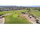 An aerial shot of the golf course featuring lush green fairways surrounded by beautiful homes at 4524 E Narrowleaf Dr, Gilbert, AZ 85298