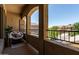 Relaxing balcony area with comfortable seating and scenic neighborhood views at 5437 W Red Bird Rd, Phoenix, AZ 85083