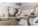 Comfortable living room features modern furnishings, neutral color palette, and ample space for relaxing and entertaining at 5437 W Red Bird Rd, Phoenix, AZ 85083