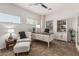 The office features a desk and chair, built-in bookshelves, carpet and natural light at 5437 W Red Bird Rd, Phoenix, AZ 85083