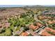 Aerial view of a neighborhood with a park, desert landscape, and tile roofs at 609 E Mesquite Cir # D132, Tempe, AZ 85288