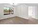 Bright dining room with modern floors and a large window overlooking the outdoors at 609 E Mesquite Cir # D132, Tempe, AZ 85288