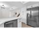 Bright kitchen with stainless steel appliances and white cabinetry at 609 E Mesquite Cir # D132, Tempe, AZ 85288