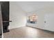 Bright living room with high ceilings, modern floors, and a decorative fireplace at 609 E Mesquite Cir # D132, Tempe, AZ 85288